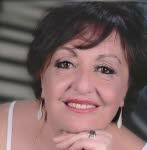 Mme Flavia Belhadj