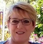 Mme Michèle Janecki