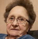 Mme Germaine Herate