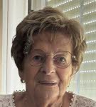 Mme Suzanne Etlicher