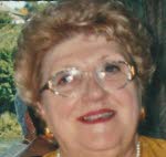Mme  Jane Baué