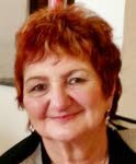 Mme Monique Strutt