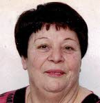 Mme  Guida Dossmann