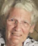 Mme Odile Corti