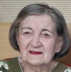 Mme  Louise Mautes