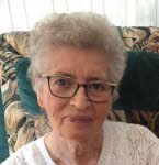 Mme Zita Simon