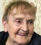 Mme Yvette Follini