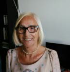 Mme Dora Laconi