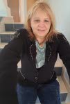Mme Anne Colot