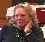 Mme Christine Schoumaker