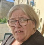 Mme  Katia Cossin