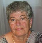 Mme Madeleine Tolfi
